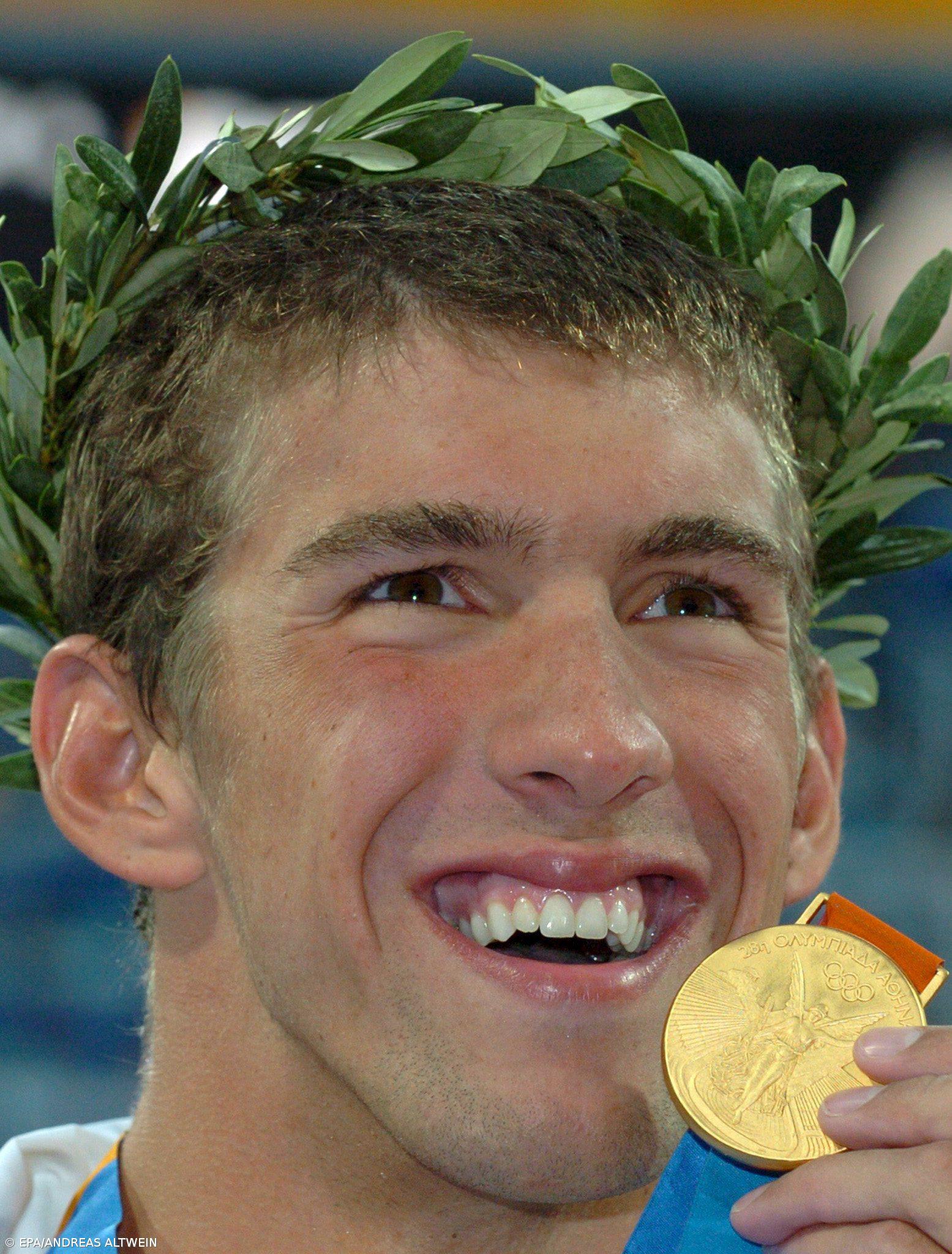 Phelps num pedestal à parte, com 11º ouro – Imagem 1